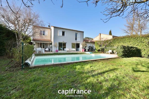 Maison 8 pièces TASSIN LE BOURG (69) de 157m² avec piscine, sous sol et garage - Parcelle de 817m²