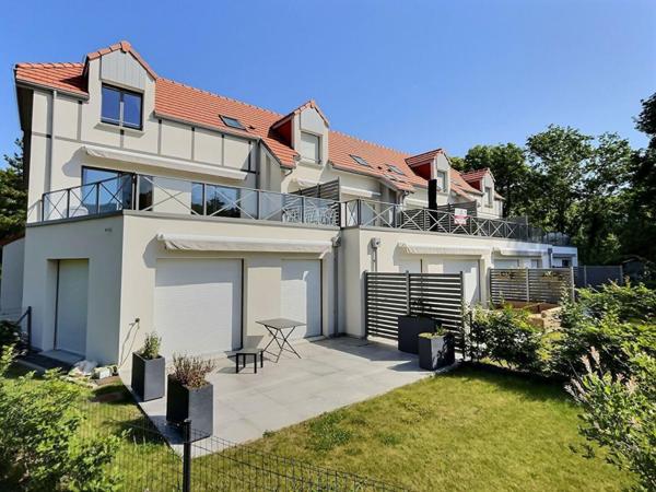 Superbe duplex 2 CHAMBRES , terrasse , garage et cave avec vue golf - 73.44 m2