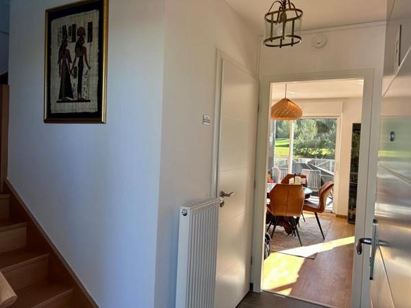 Superbe duplex 2 CHAMBRES , terrasse , garage et cave avec vue golf - 73.44 m2