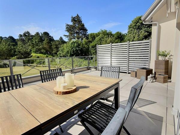 Superbe duplex 2 CHAMBRES , terrasse , garage et cave avec vue golf - 73.44 m2