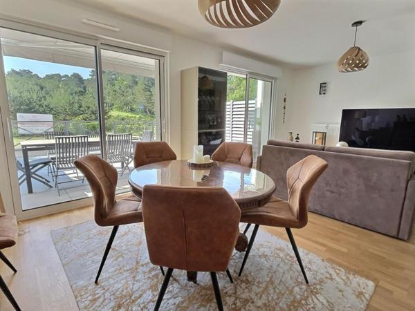 Superbe duplex 2 CHAMBRES , terrasse , garage et cave avec vue golf - 73.44 m2