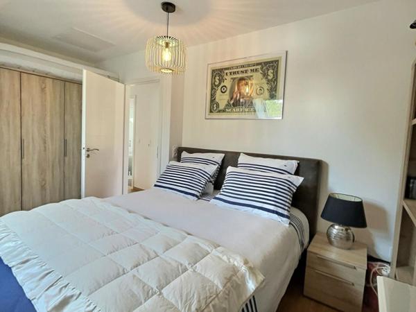 Superbe duplex 2 CHAMBRES , terrasse , garage et cave avec vue golf - 73.44 m2