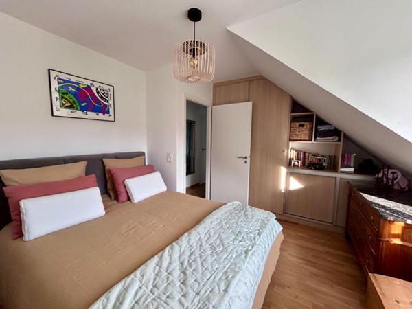 Superbe duplex 2 CHAMBRES , terrasse , garage et cave avec vue golf - 73.44 m2