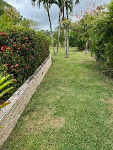 A VENDRE PROCHE JARRY DANS RESIDENCE PRIVEE CALME VILLA T4 AVEC PISCINE SUR 1120 M² DE TERRAIN .