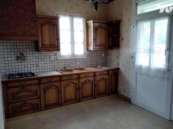 Maison d'habitation proche centre-ville avec terrain