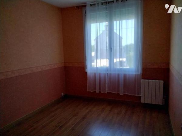 Maison d'habitation proche centre-ville avec terrain