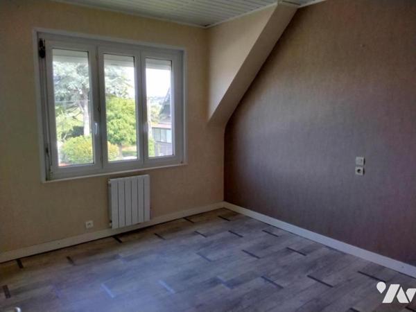 Maison d'habitation proche centre-ville avec terrain