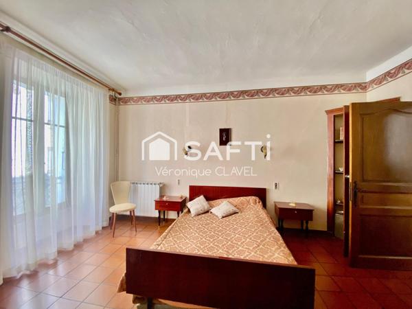 Bel appartement de 127m2  avec balcon dans un Immeuble Bourgeois