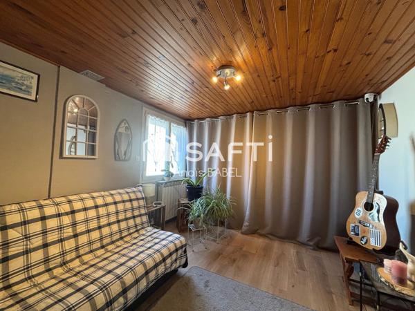Confort, cour et garages : maison à ne pas manquer