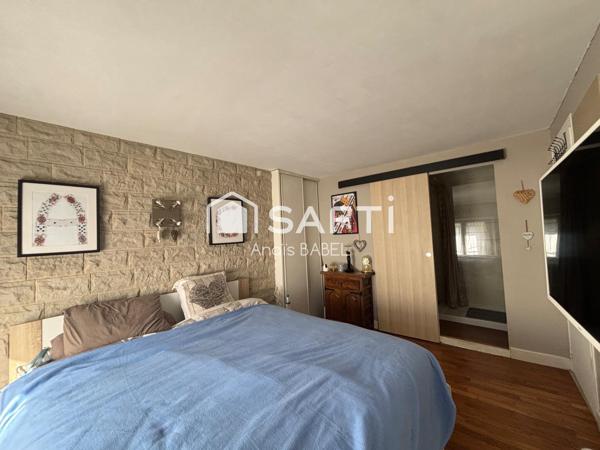 Confort, cour et garages : maison à ne pas manquer