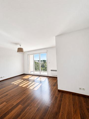 T3 lumineux de 68 m² avec balcon, ascenseur et 2 parkings ? Résidence sécurisée