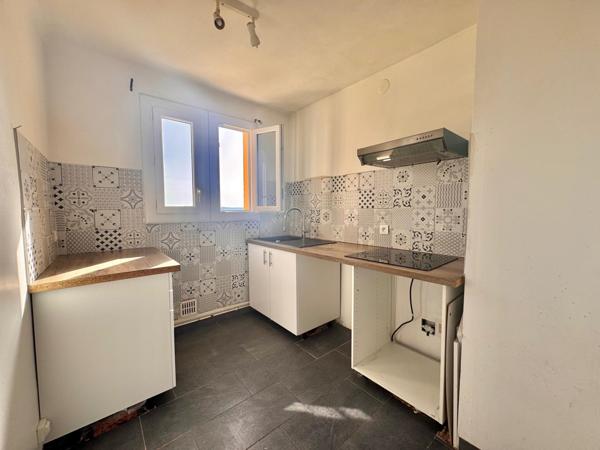 Appartement T4 78m2 avec cave et balcon