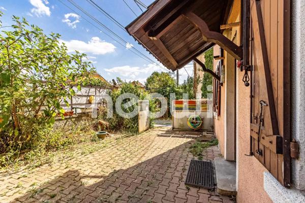 Maison à rénover avec extérieur et garage