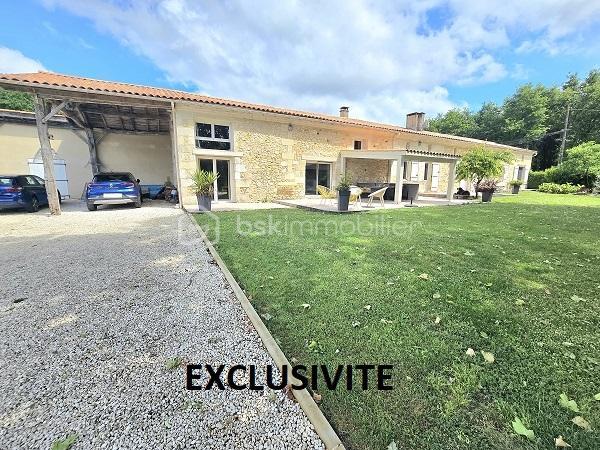 Située à 25 mn de LIBOURNE, à 35 mn de ST EMILION, à 45 mn de BLAYE et du pont d'Aquitaine de Bordeaux, cette magnifique maison en pierres, de 379 m2, sur un terrain clôturé et arboré de plus de 1.8 hectare, entièrement rénovée, vous séduira par ses volumes et ses prestations de standing. Cette demeure est composée d'une cuisine entièrement équipée de 33 m2, d'un salon/salle à manger de 105 m2, d'un bureau, de 4 chambres, de 2 salles de bain, 2 salles d'eau, 4 WC, une buanderie, un cellier et une mezzanine de 16 m2. Des dépendances (garage, cave, cellier, réserve à granules) et une piscine 10m X 4m, avec son pool house, complètent ces prestations. Chauffage à granules + cheminée avec un insert. COUP DE COEUR absolu !!!
