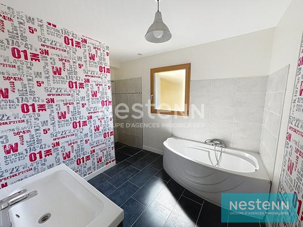 Vente d'une maison de plain pied 3 chambres avec garage dans le bourg de Coëtmieux