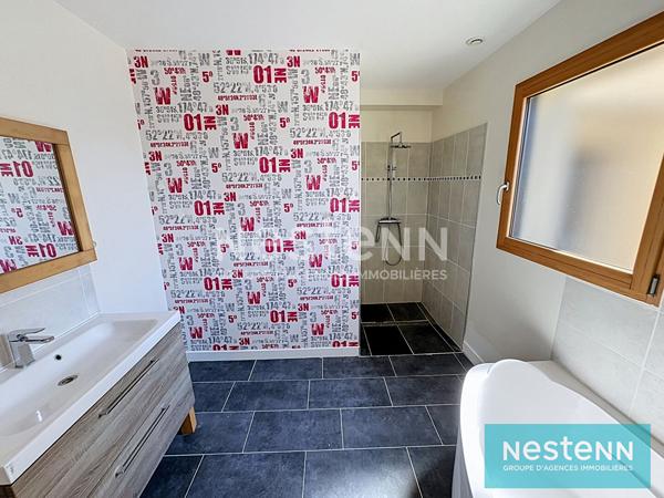 Vente d'une maison de plain pied 3 chambres avec garage dans le bourg de Coëtmieux