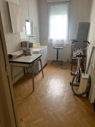 maison de quartier pur produit de la coopérative de reconstruction de Reims