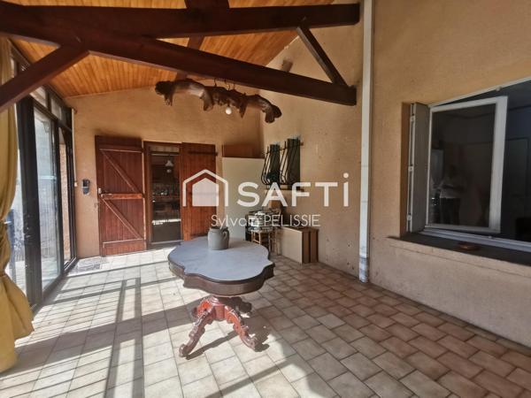 Maison de ville avec studio indépendant, grand garage de 70 m² et jardin clos en plein centre de Moissac !