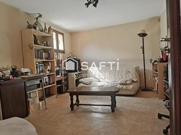 Maison de ville avec studio indépendant, grand garage de 70 m² et jardin clos en plein centre de Moissac !
