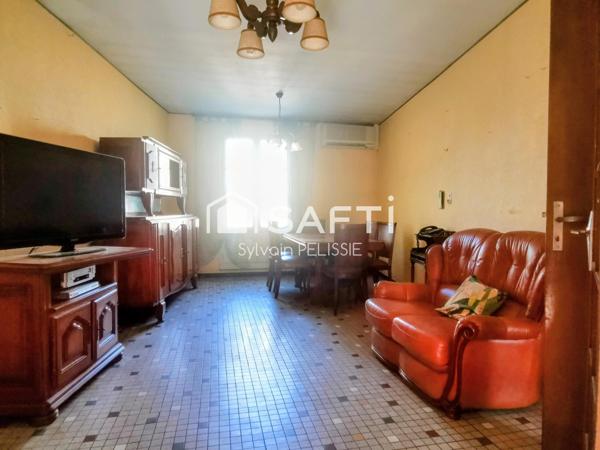 Maison de ville avec studio indépendant, grand garage de 70 m² et jardin clos en plein centre de Moissac !