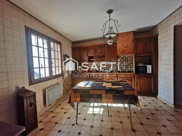 Maison de ville avec studio indépendant, grand garage de 70 m² et jardin clos en plein centre de Moissac !