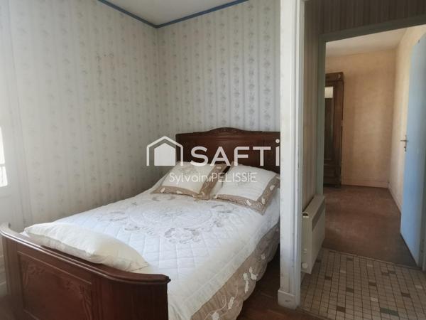 Maison de ville avec studio indépendant, grand garage de 70 m² et jardin clos en plein centre de Moissac !