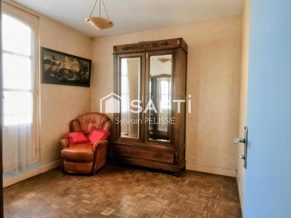 Maison de ville avec studio indépendant, grand garage de 70 m² et jardin clos en plein centre de Moissac !