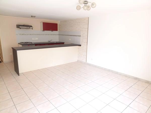 À vendre : Appartement avec 2 chambres, bureau et 2 terrasses privatives dans maison en pierre