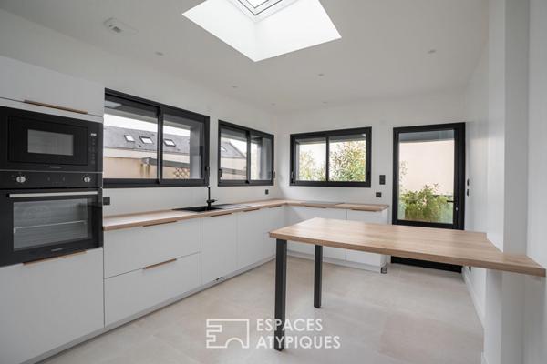 L’esprit « Maison de Maître » pour cet appartement avec jardin entre St-Donatien et la Gare