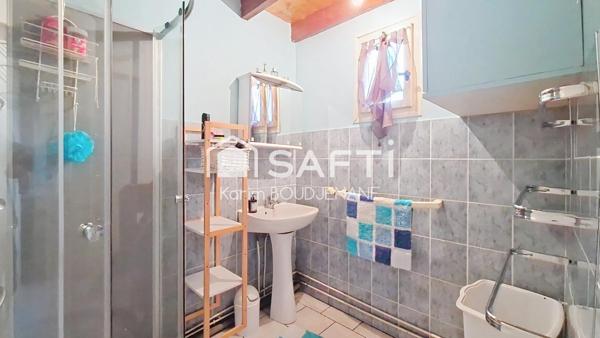 PLAIN-PIED de 70 m2 sur 500 m2 de terrain, 2 chambres...