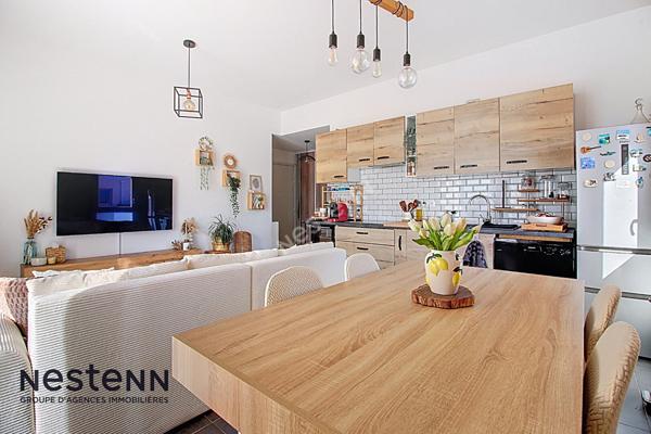 Appartement 3 pièces de 60m² avec terrasse et place de parking privative en sous sol