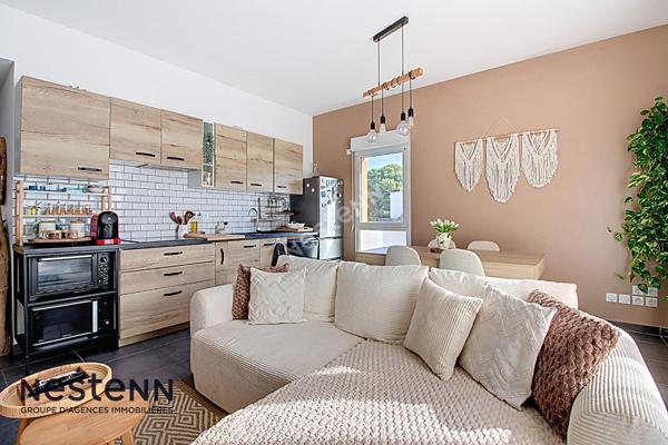 Appartement 3 pièces de 60m² avec terrasse et place de parking privative en sous sol