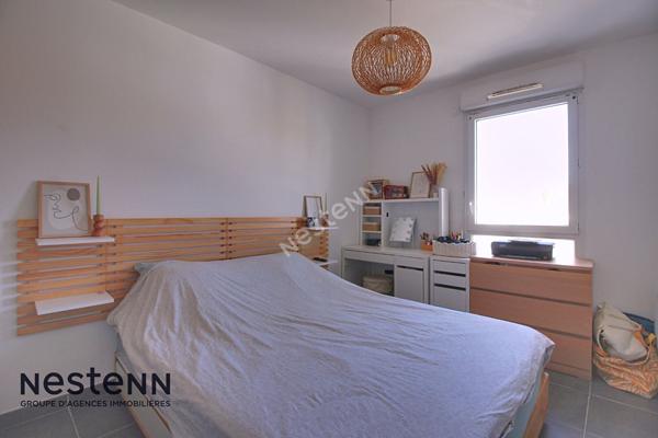 Appartement 3 pièces de 60m² avec terrasse et place de parking privative en sous sol