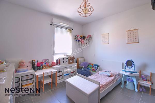 Appartement 3 pièces de 60m² avec terrasse et place de parking privative en sous sol