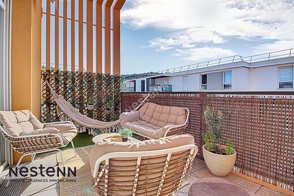 Appartement 3 pièces de 60m² avec terrasse et place de parking privative en sous sol