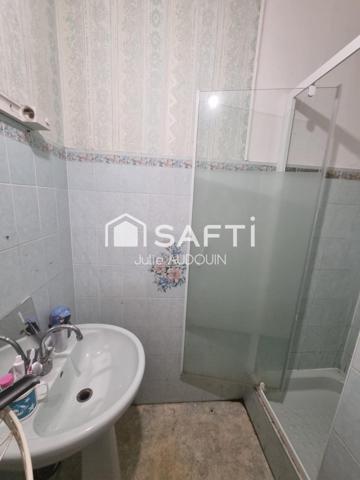 Centre-ville de Matha – 2 logements + Grand Dépôt