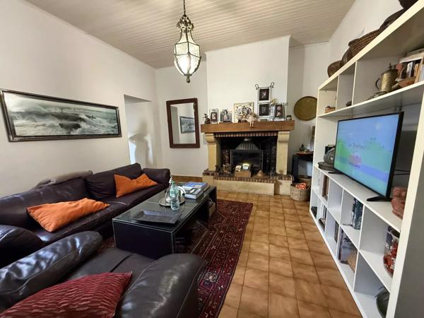Grande maison familiale avec local commercial