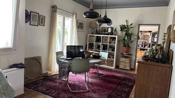 Grande maison familiale avec local commercial