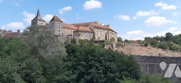 Maison de bourg avec garage et jardin