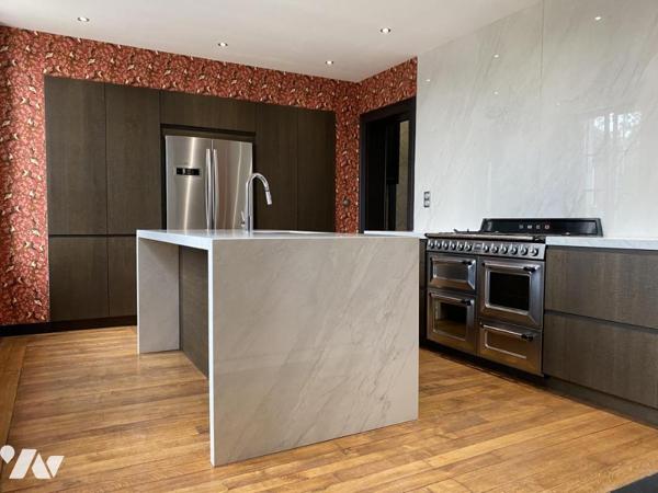 LE CATEAU CAMBRESIS : Appartement en rez-de-chaussée - deux chambres - jardin et garage