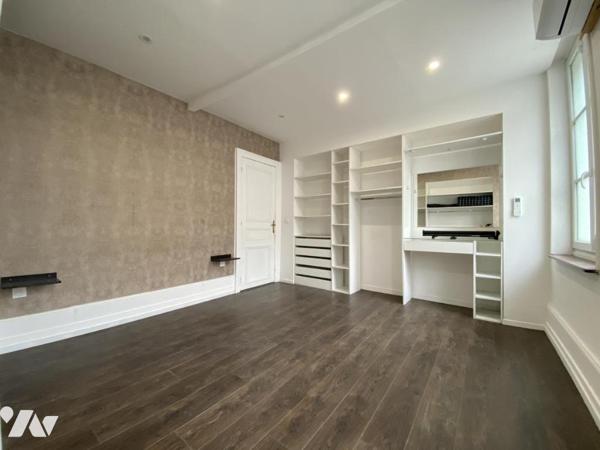 LE CATEAU CAMBRESIS : Appartement en rez-de-chaussée - deux chambres - jardin et garage