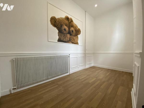 LE CATEAU CAMBRESIS : Appartement en rez-de-chaussée - deux chambres - jardin et garage