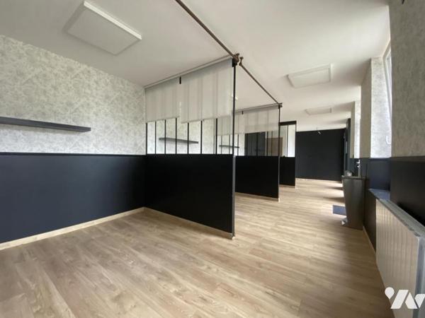 LE CATEAU CAMBRESIS : Appartement en rez-de-chaussée - deux chambres - jardin et garage