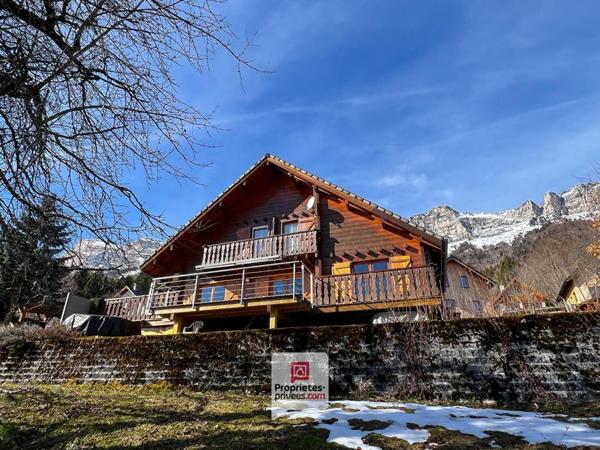 Plateau des Petites Roches (38660) - Chalet T6 en madriers + studio + carport + jardin