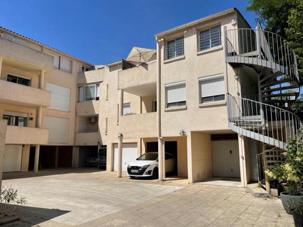 APPARTEMENT F3 69 M² TERRASSE ET BOX