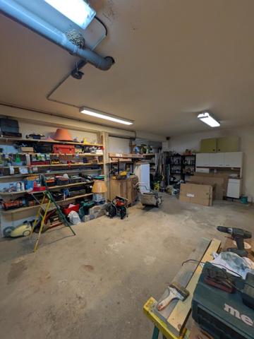 Maison 3 faces de 3 appartements + 3 garages + jardin + terrain