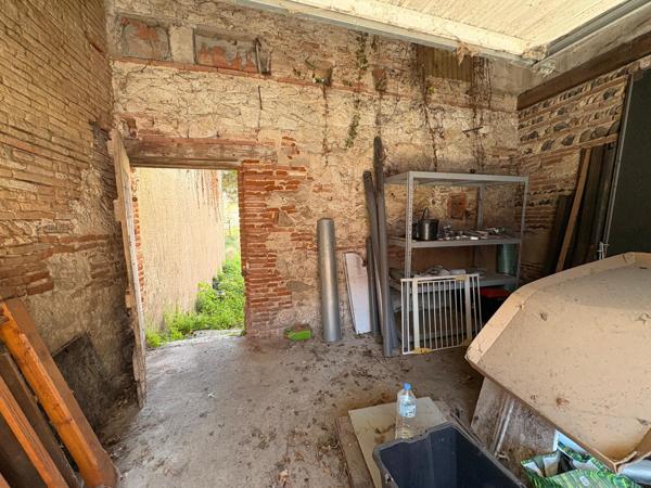 garage et terrain en zone urbaine