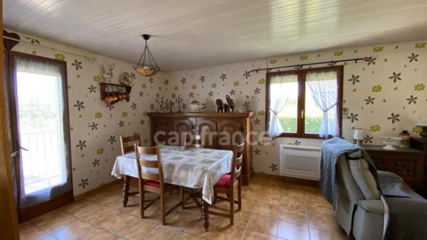 Maison plain-pied avec terrain de 1348 m² et garage à Ruoms (07120)