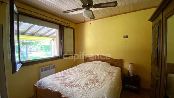 Maison plain-pied avec terrain de 1348 m² et garage à Ruoms (07120)