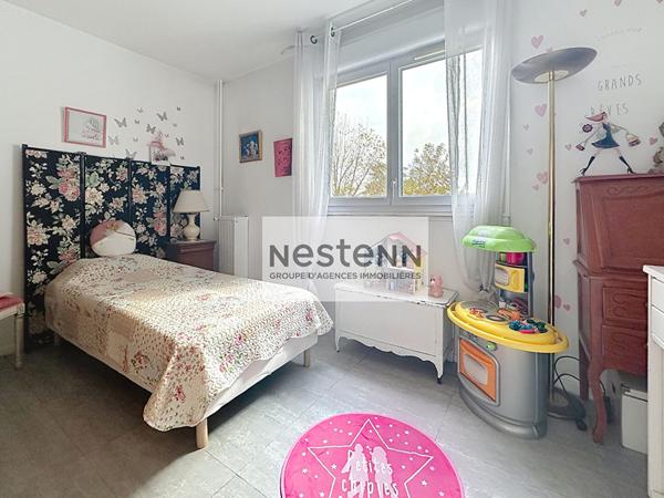 Appartement 3 pièces - balcon - ascenseur - parking.